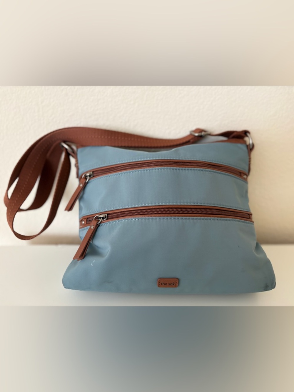 The Sak Blue  Denim Crossbody with Brown Trim